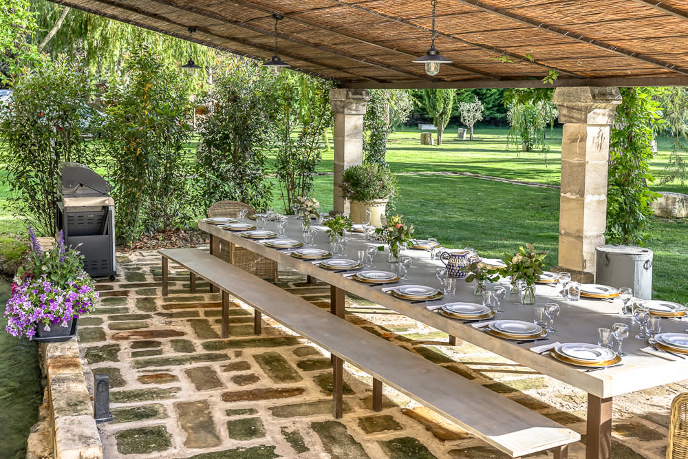Villa garden with dining table